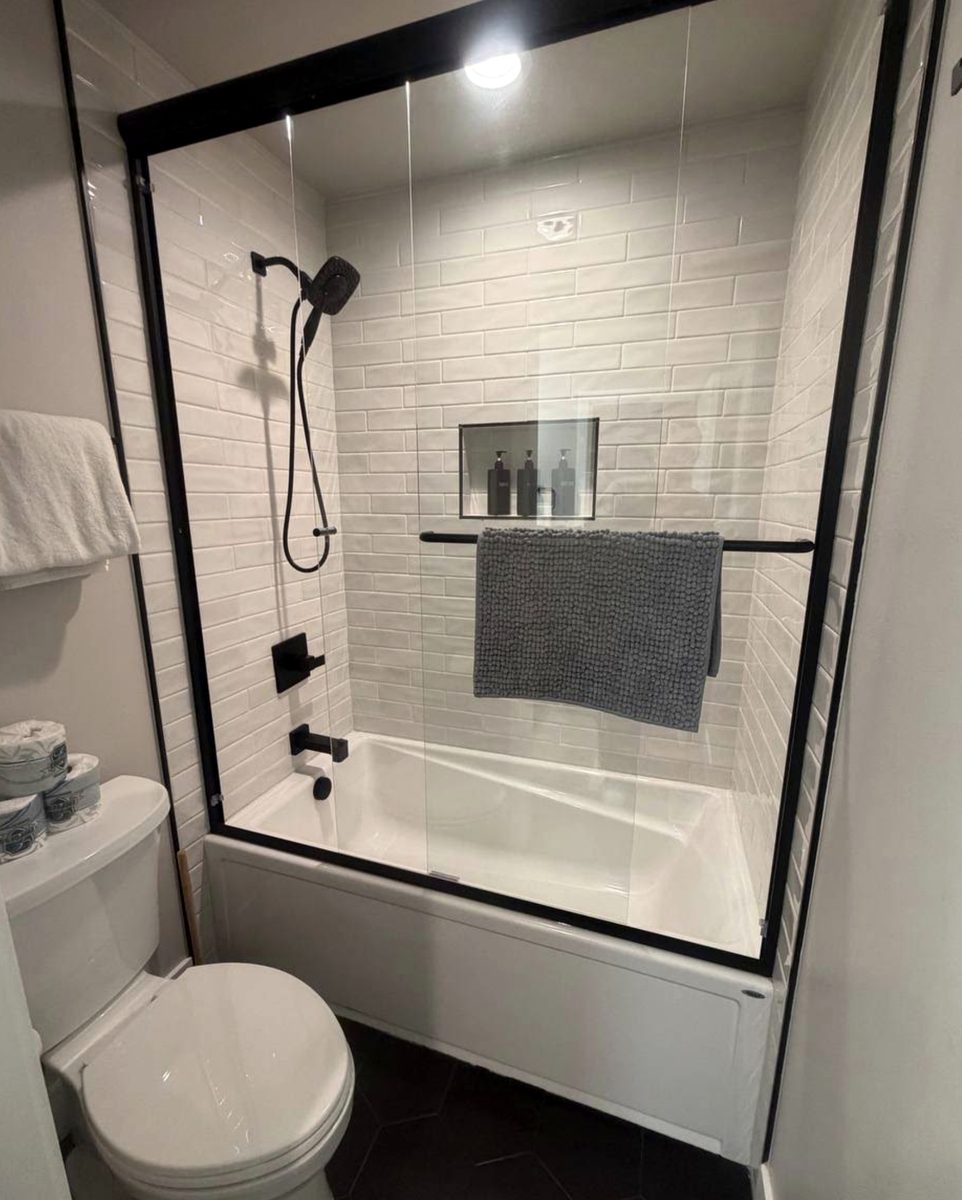 New tub and shower combo with tile surround